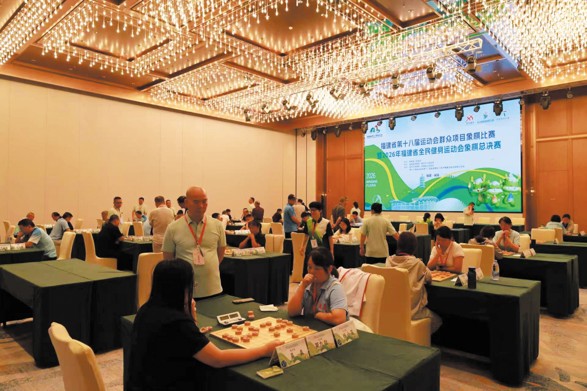 省第十八届运动会群众项目象棋比赛在梅开赛